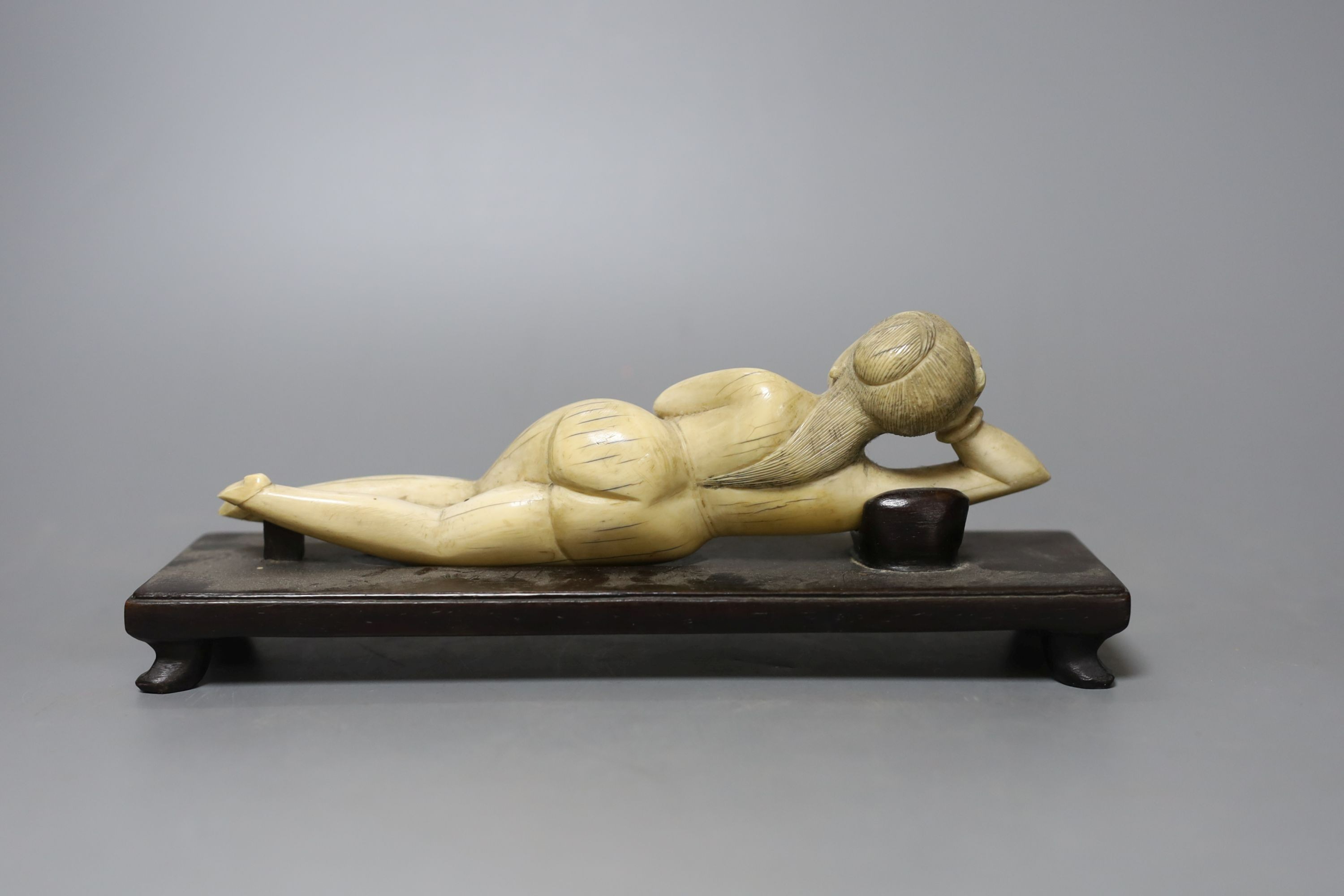 A Chinese ivory female nude medicine figure, on plinth, 19th century, 20cm